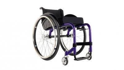 küschall The KSL manual wheelchair ramme colour atomic violet with backrest folded